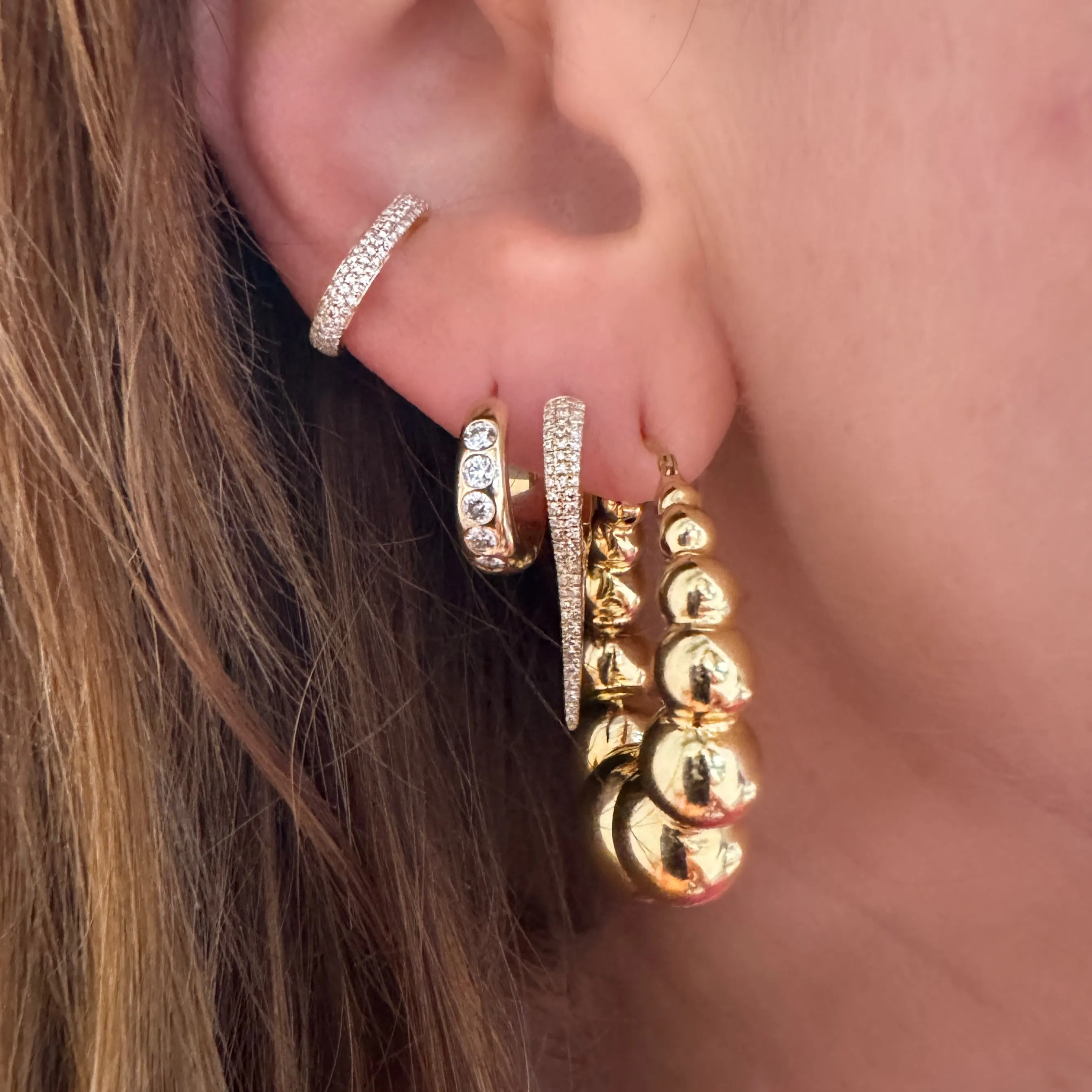 Graduated Puffy Gold Ball Hoop Earrings