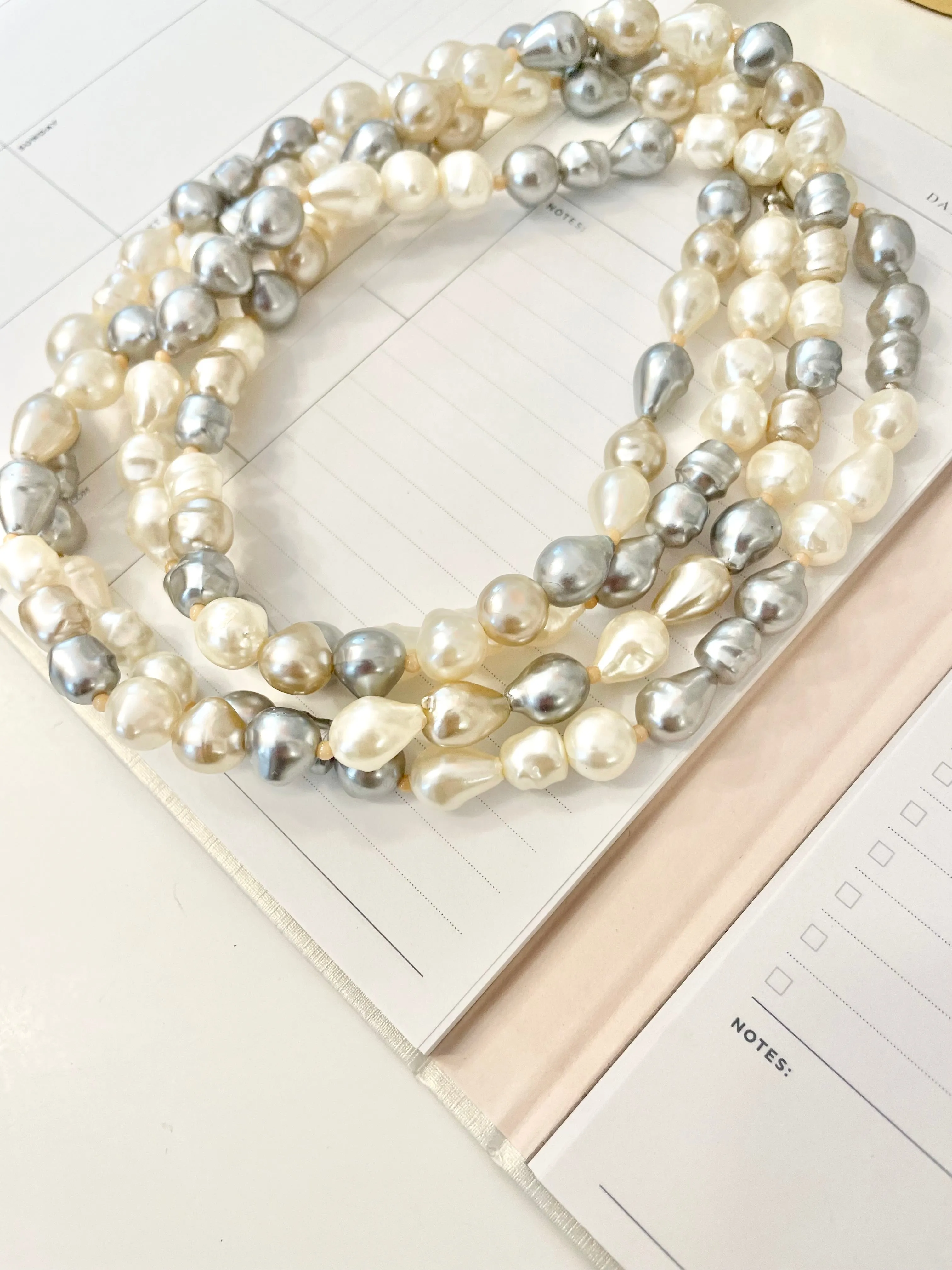 Lovely faux opera length pearls... so chic