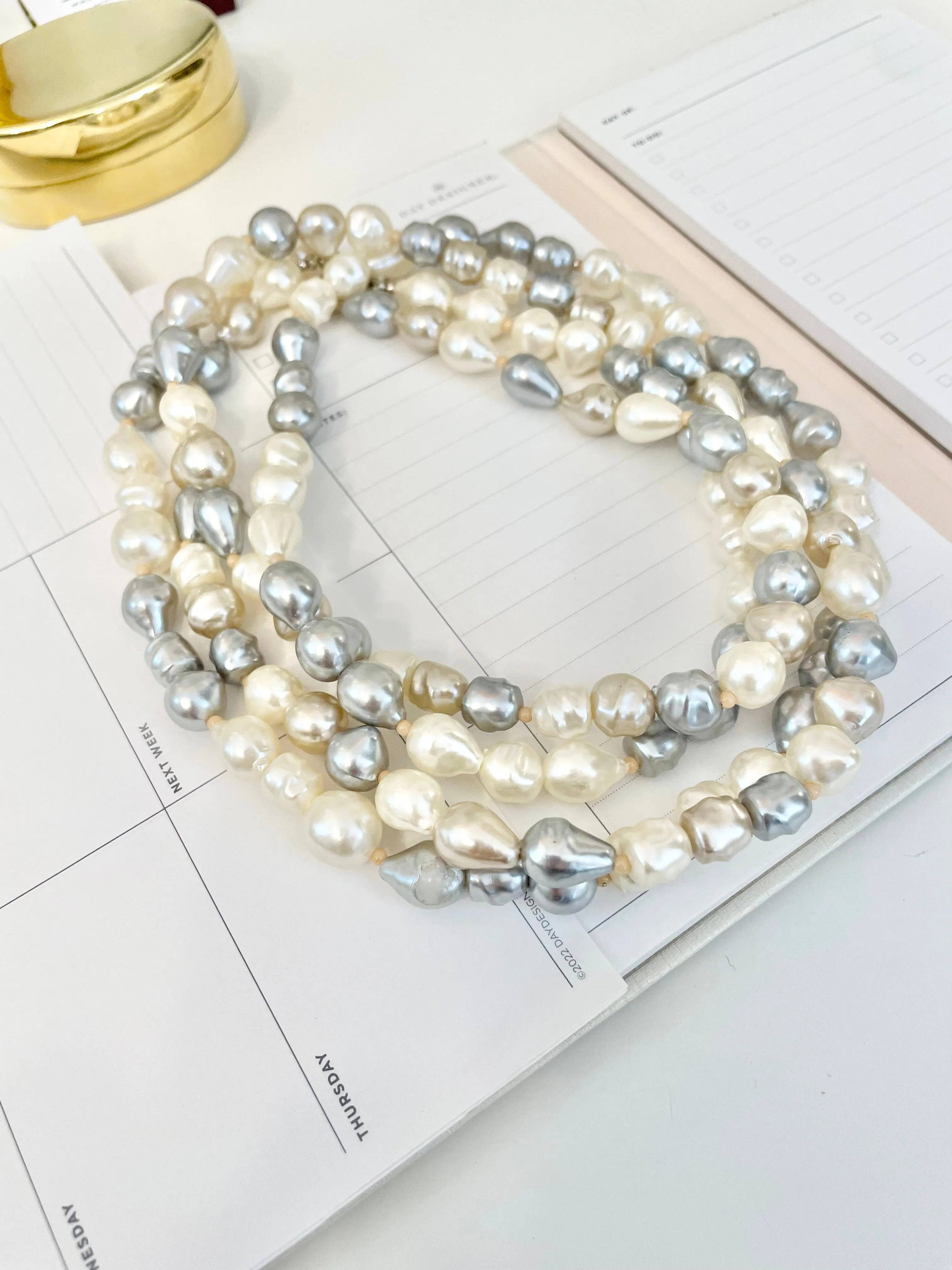 Lovely faux opera length pearls... so chic