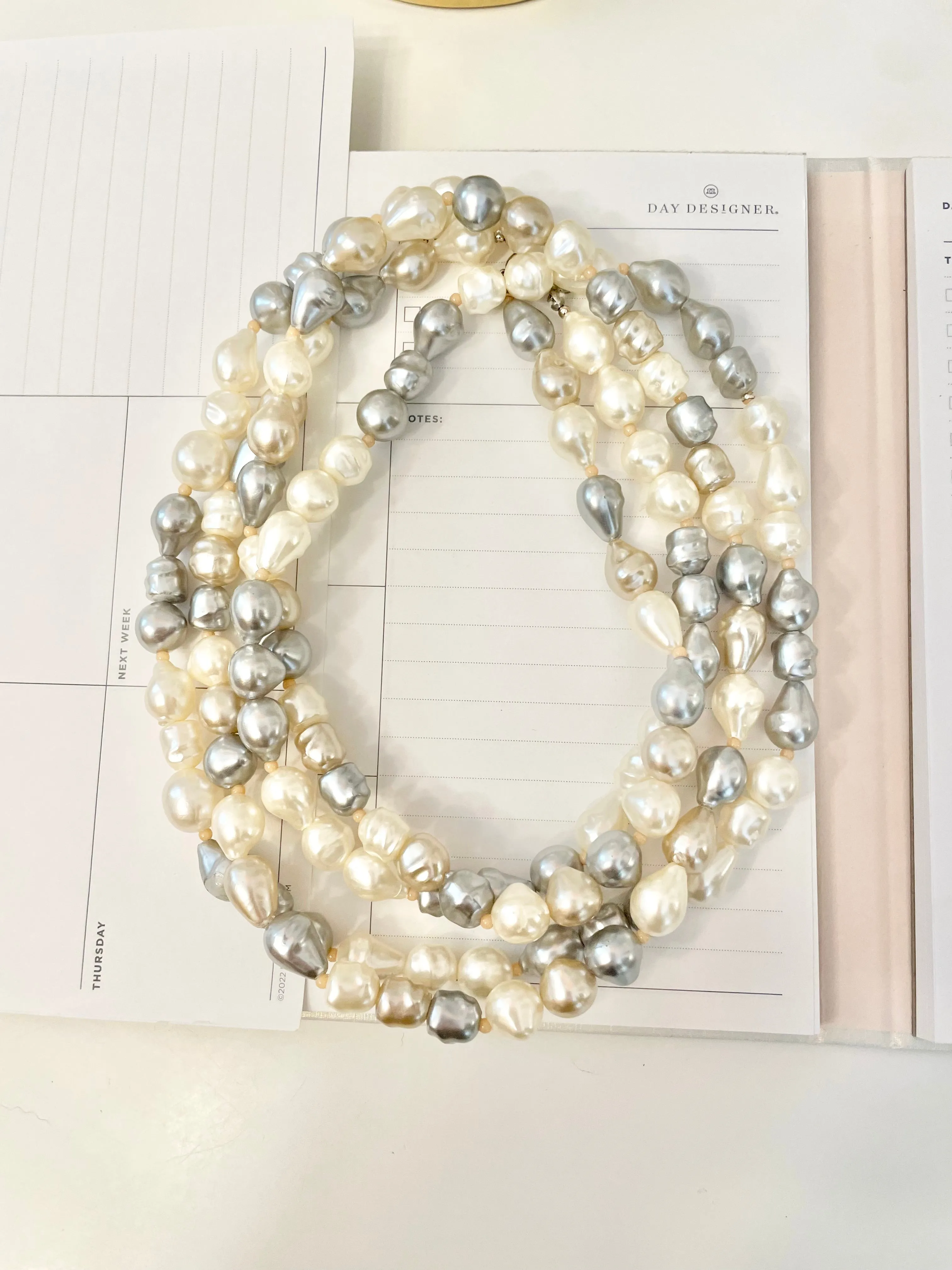 Lovely faux opera length pearls... so chic
