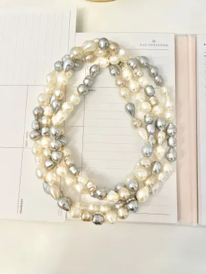Lovely faux opera length pearls... so chic